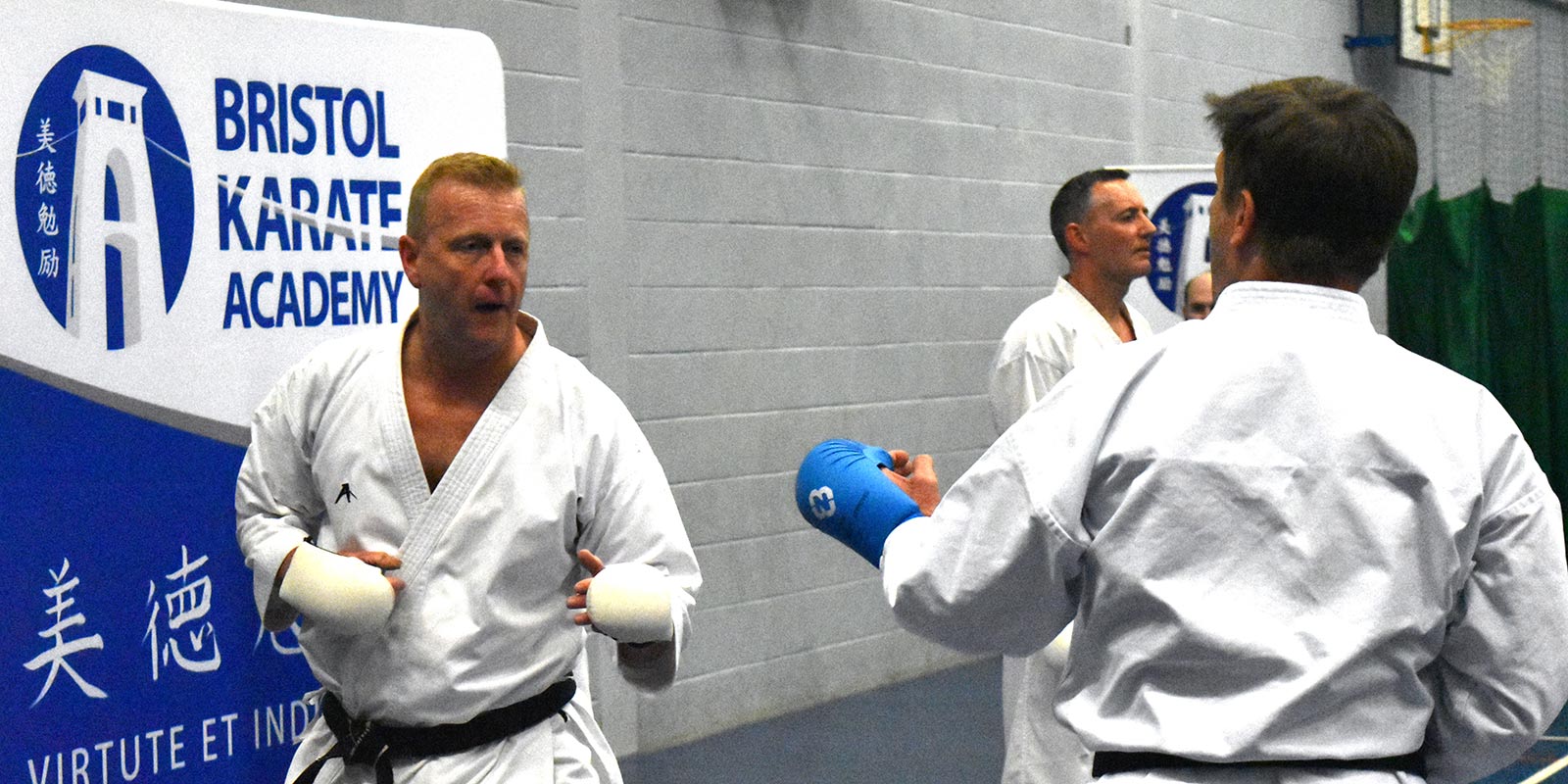 Ian Connell Sensei faces off during kumite training