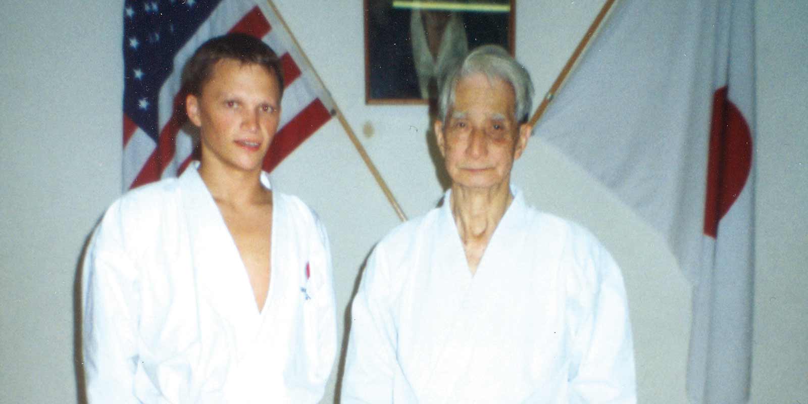 Sensei Tim Griffiths with the late Sensei Nakayama, 10th Dan, at his Los Angeles dojo in 2003