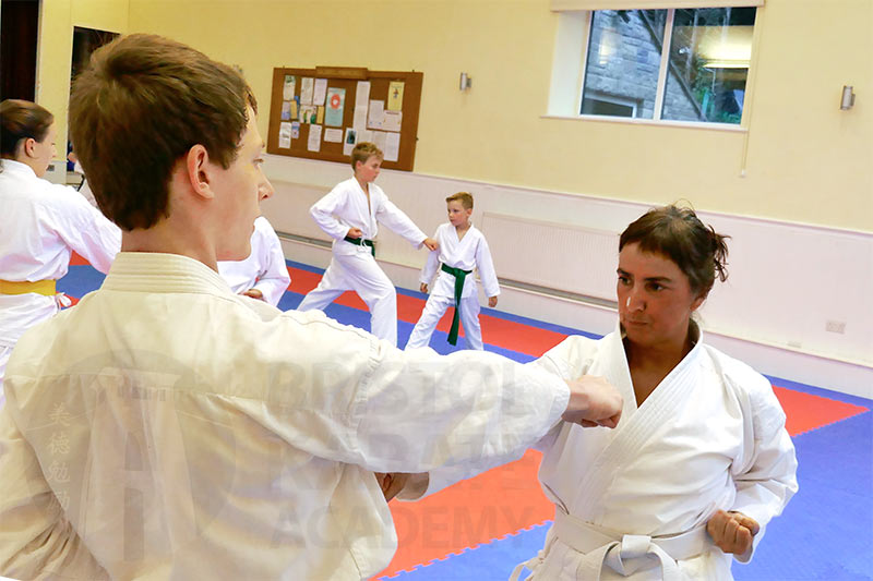 Safeguarding and welfare - two members take part in sparring drill
